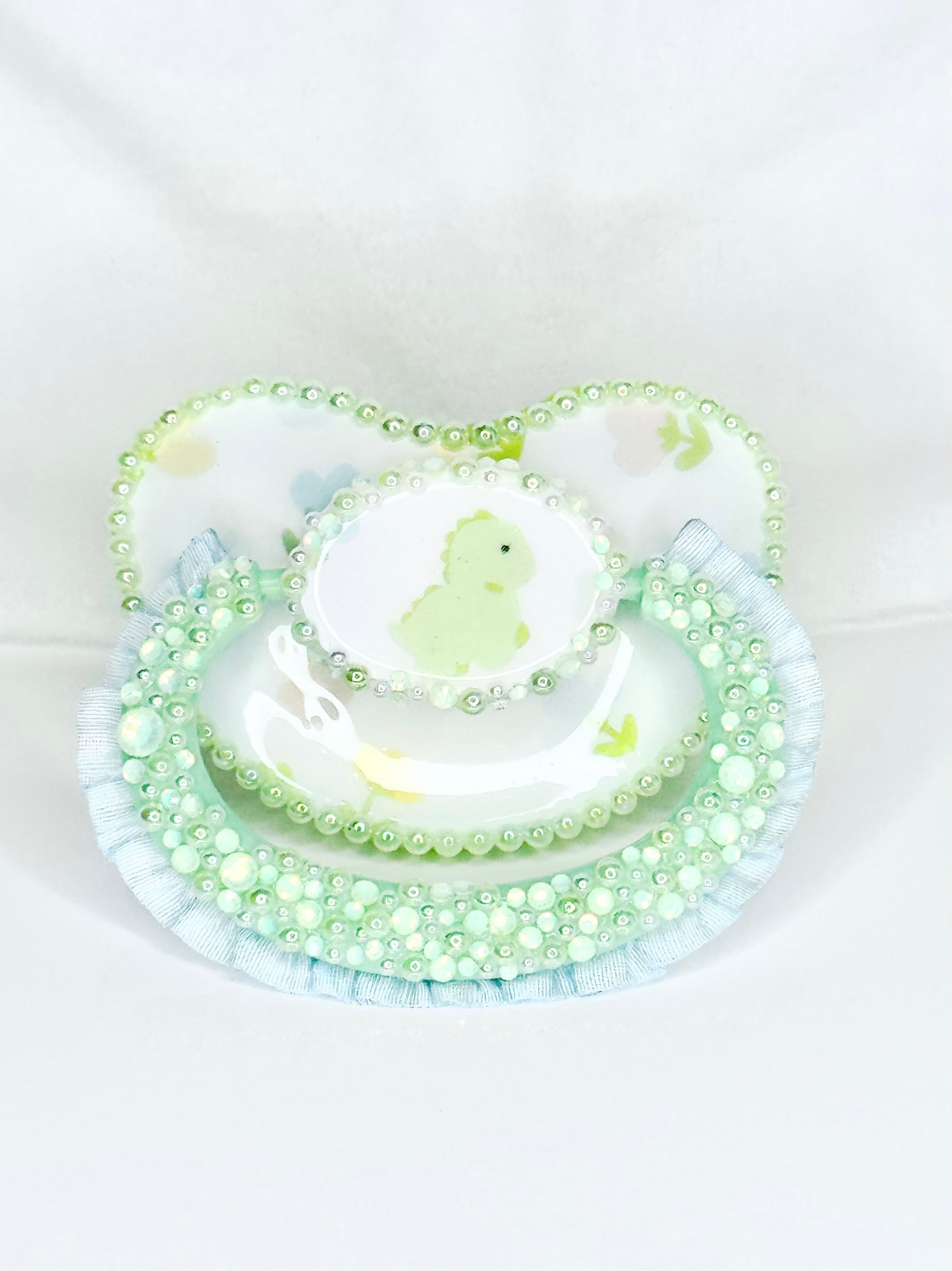 Baby Dino lace handle vinyl image pacifier