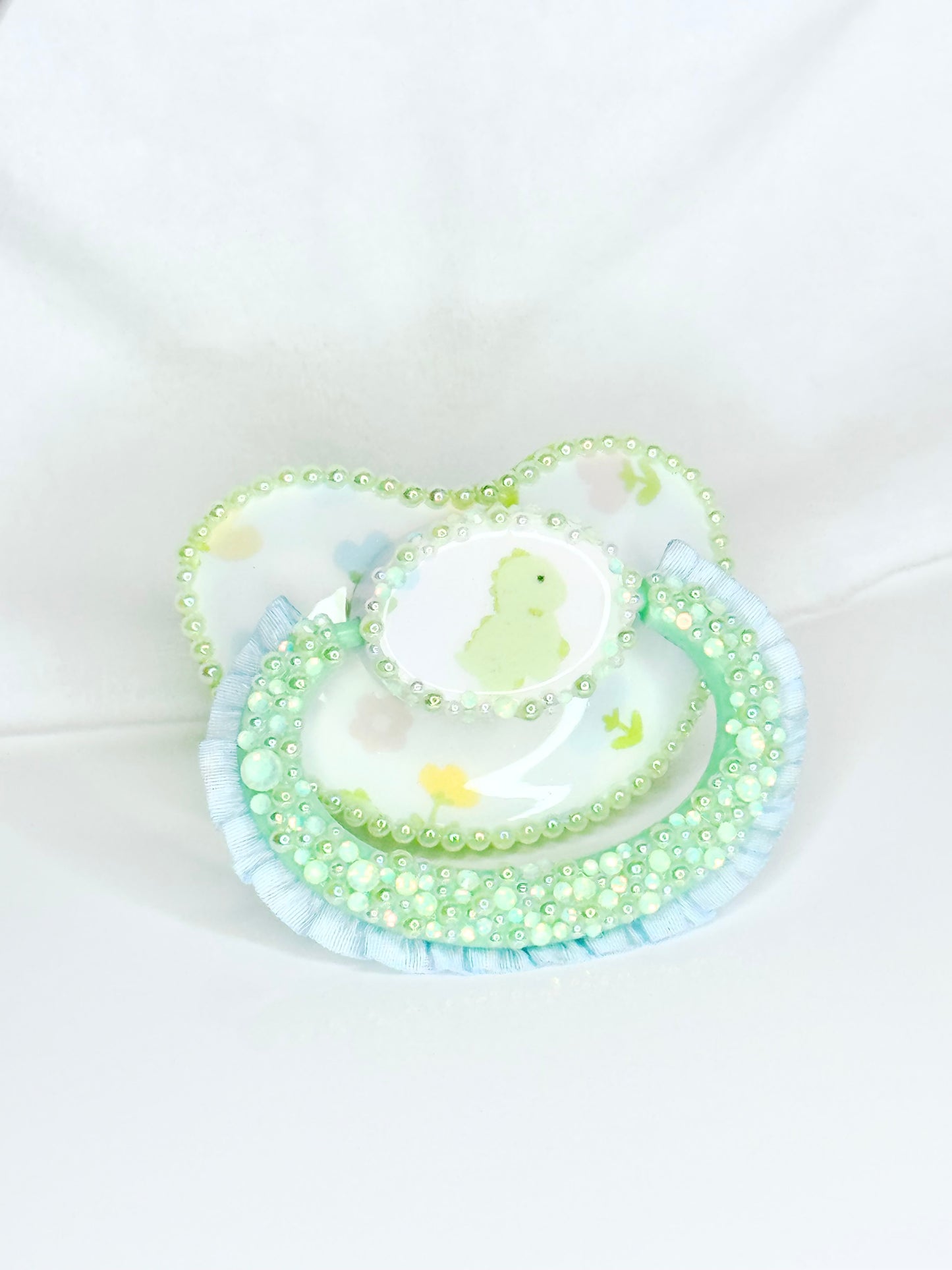 Baby Dino lace handle vinyl image pacifier
