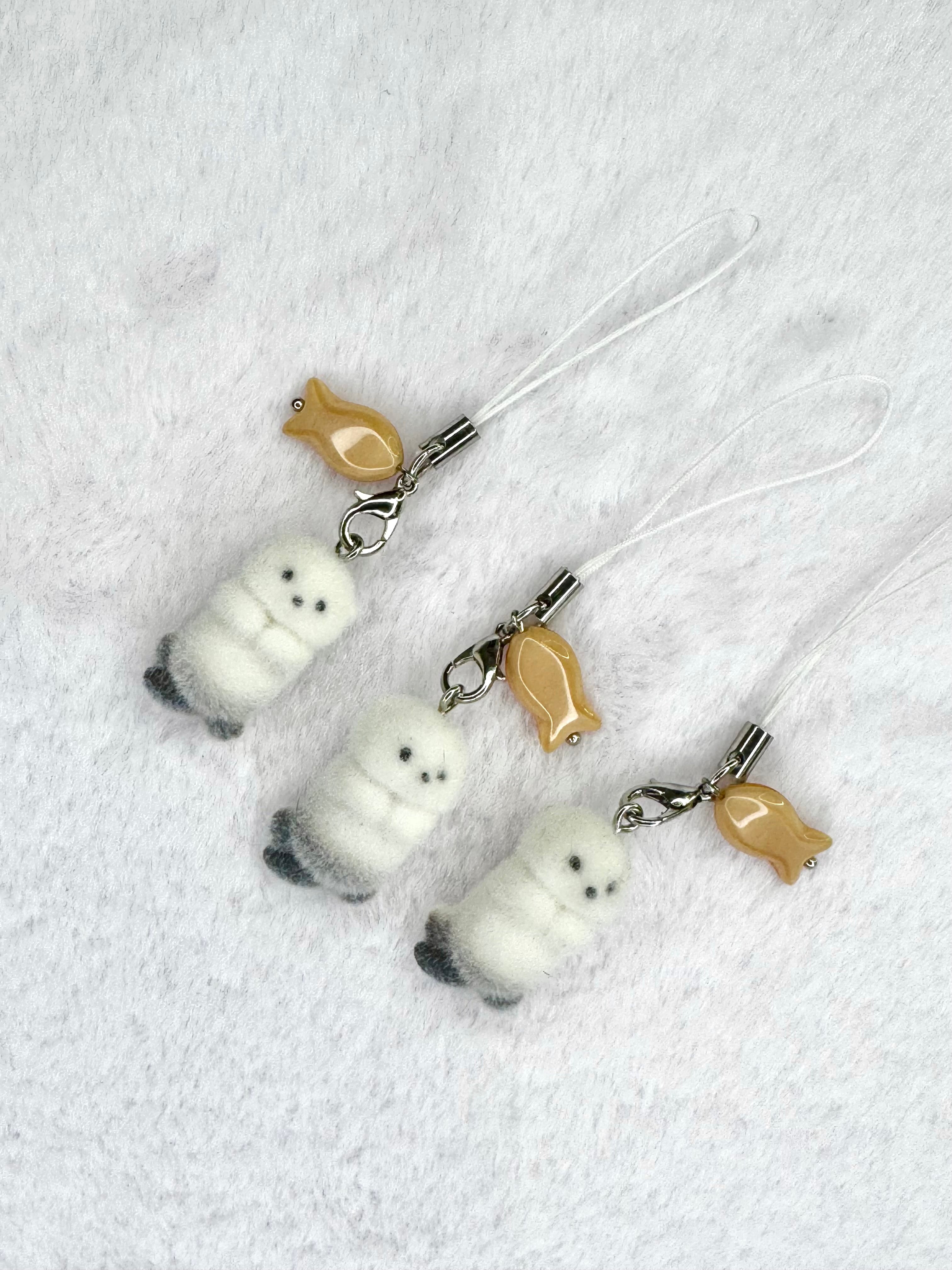 Sea otter phone charms