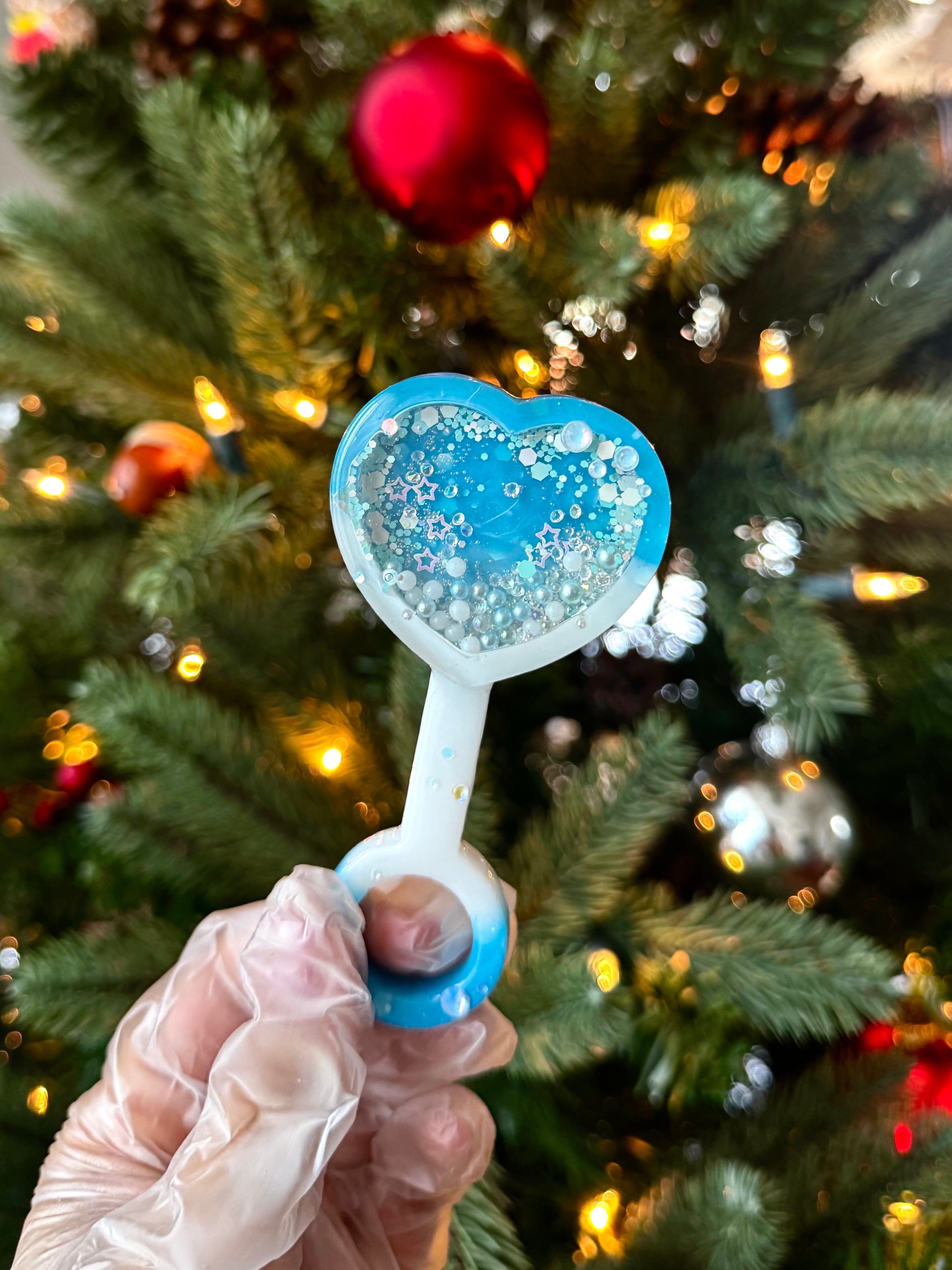 Blue heart resin rattle