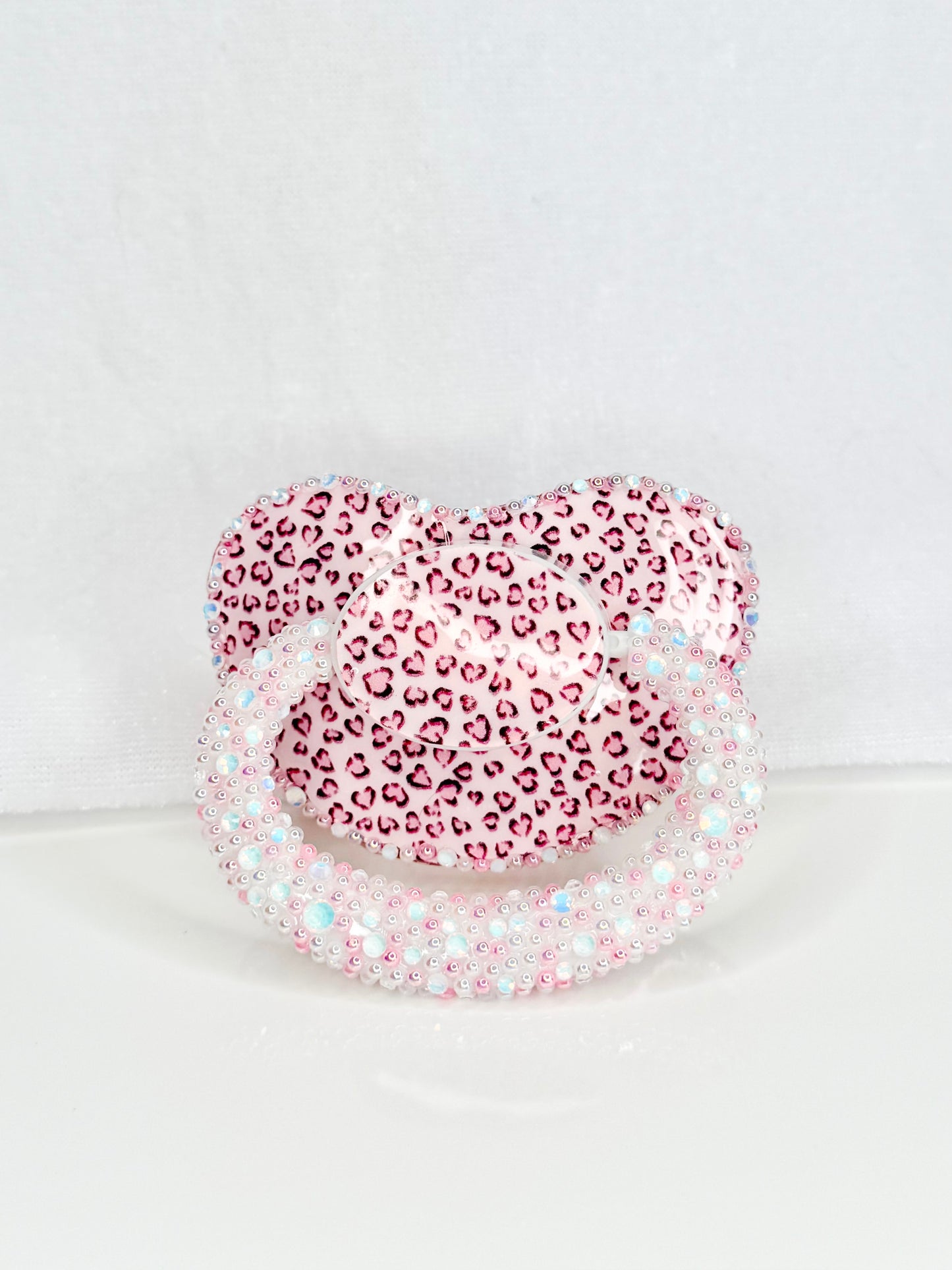 Leopard print vinyl image heat sealed adult sized pacifier