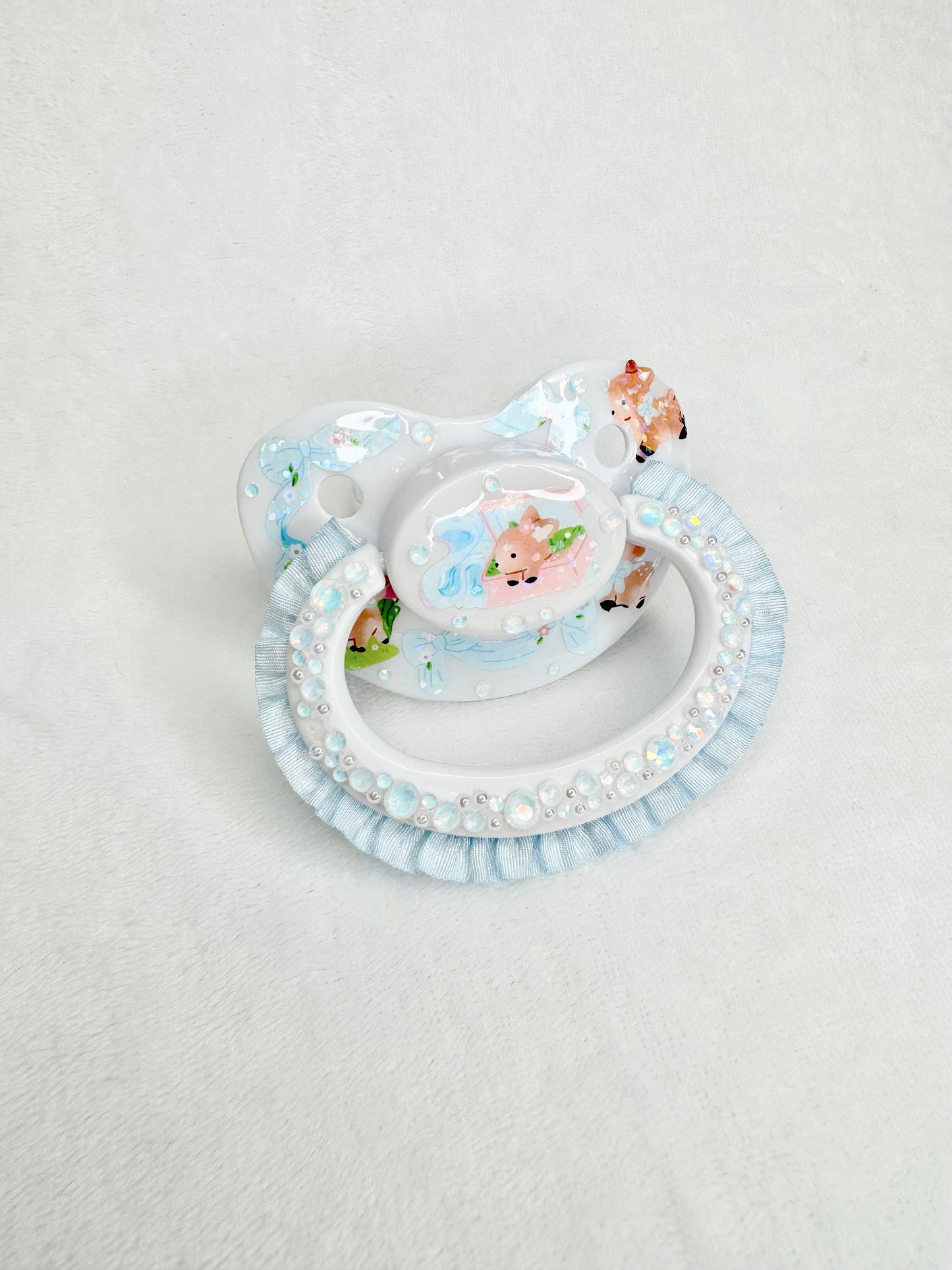 Soft baby blue woodland adult pacifier