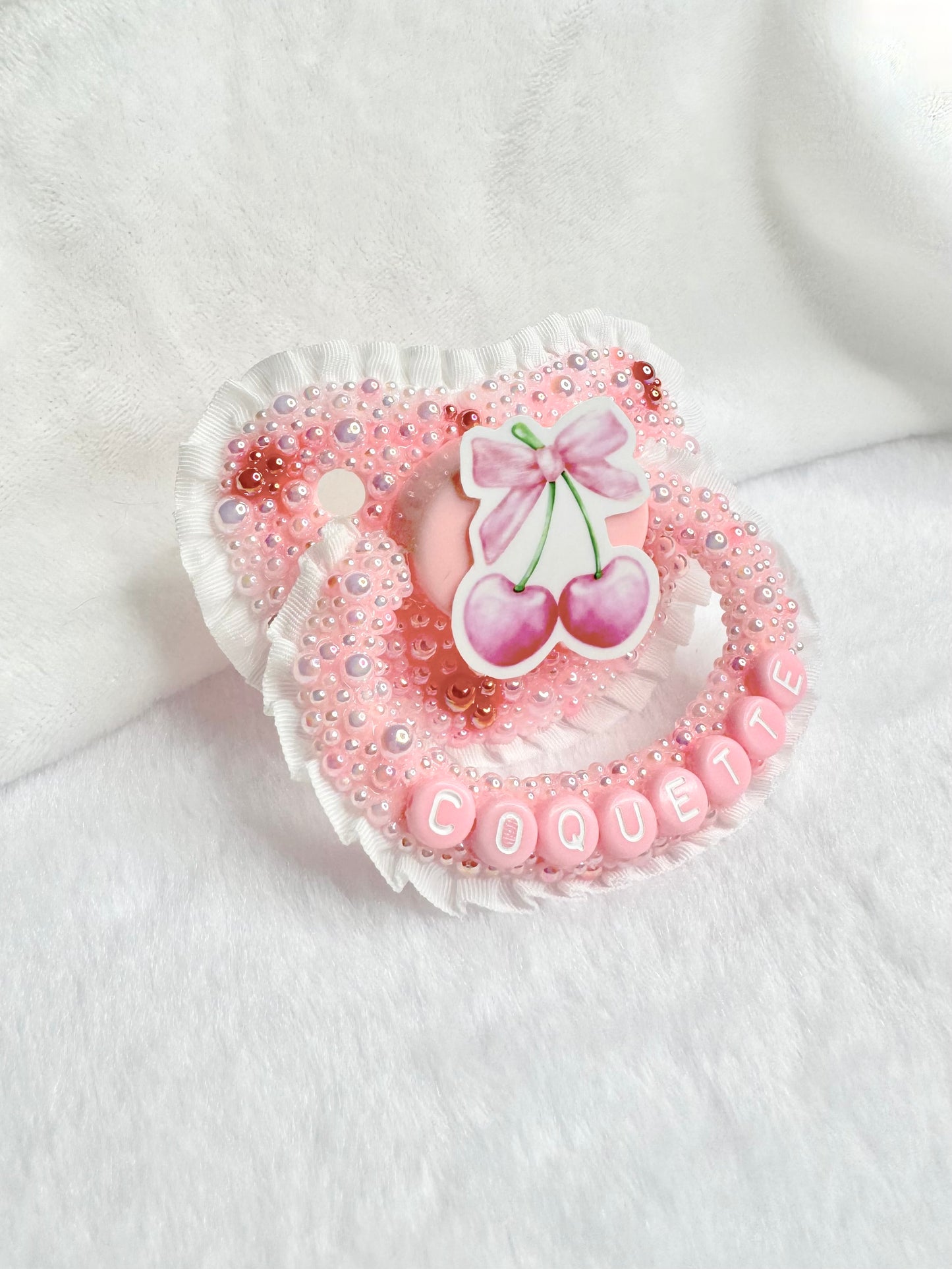 Coquette chère adult pacifier