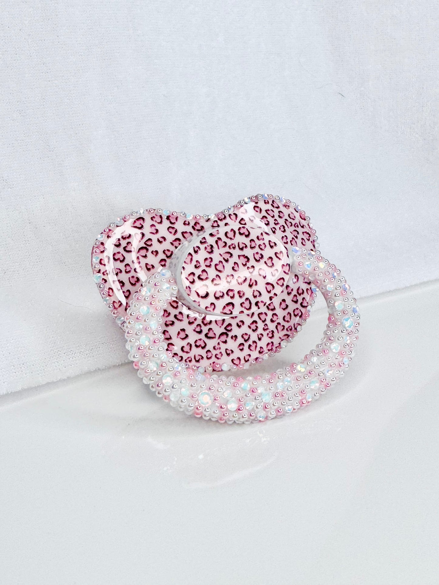 Leopard print vinyl image heat sealed adult sized pacifier