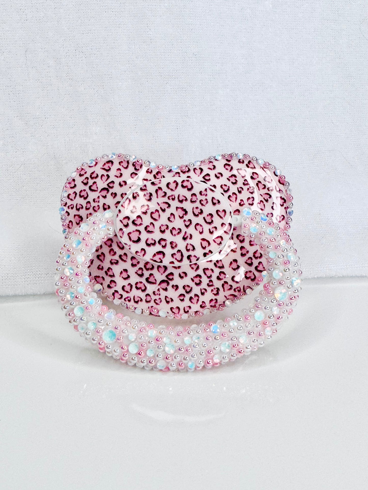 Leopard print vinyl image heat sealed adult sized pacifier