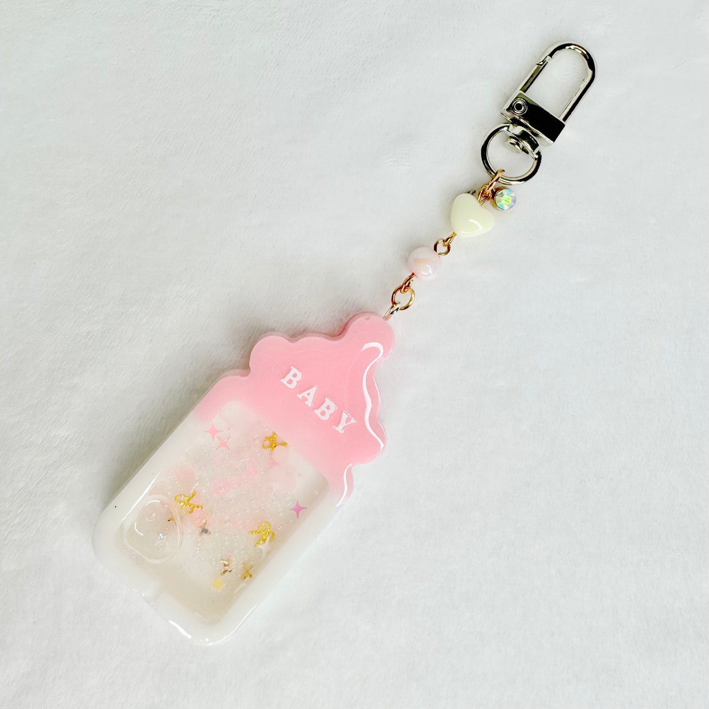 Baby bottle liquid keycharm