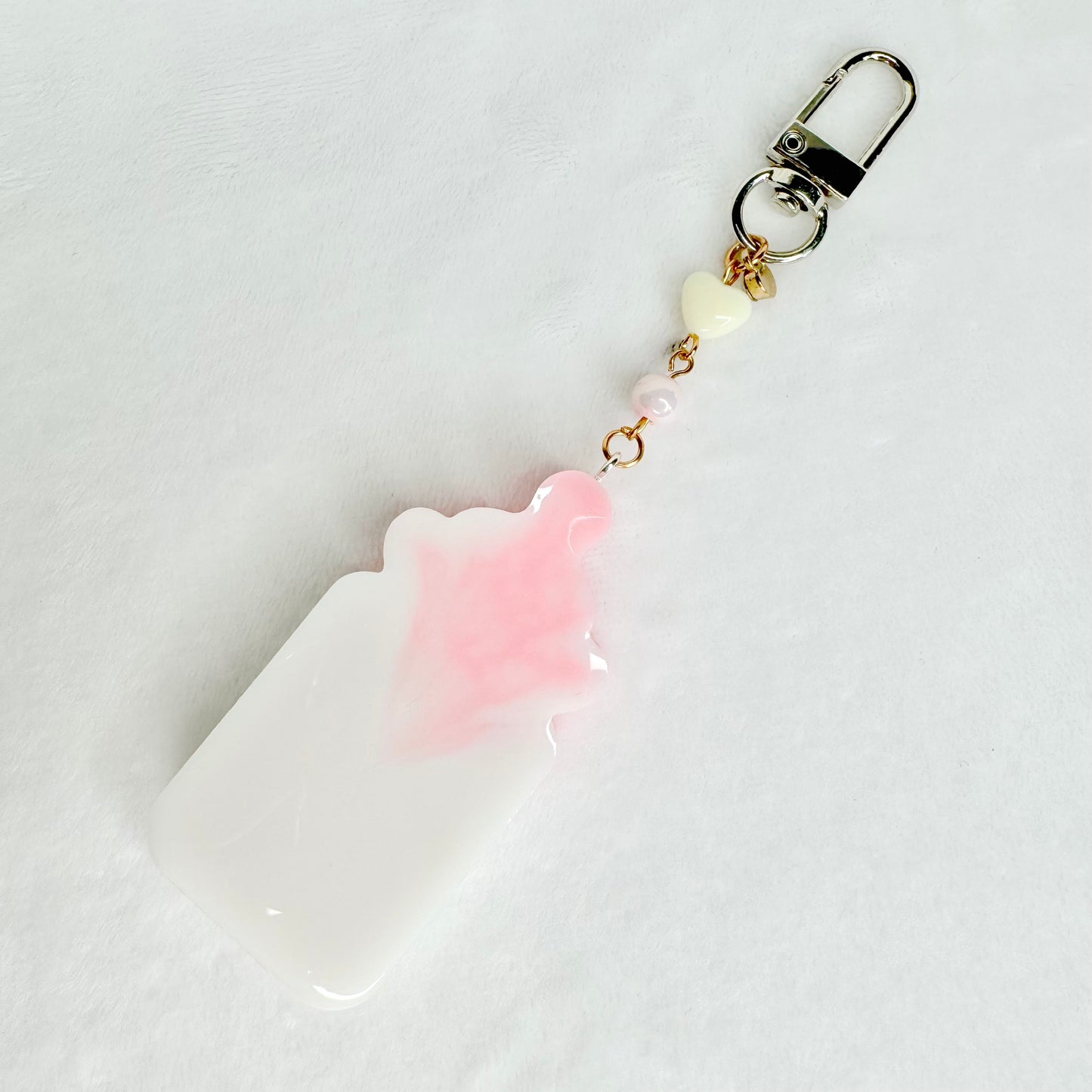 Baby bottle liquid keycharm