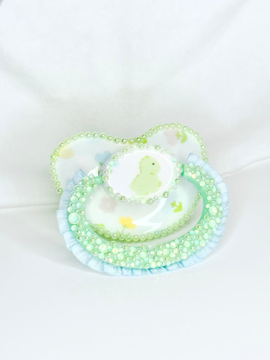 Baby Dino lace handle vinyl image pacifier